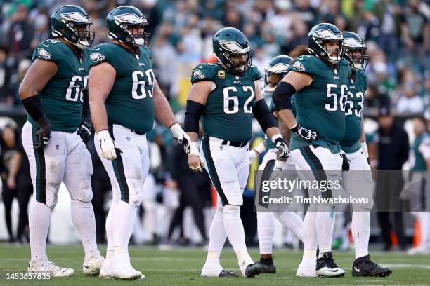 Philadelphia Eagles offensive line reacts against the New Orleans Saints during the fourth quarter at Lincoln Financial Field on January 01, 2023 in...