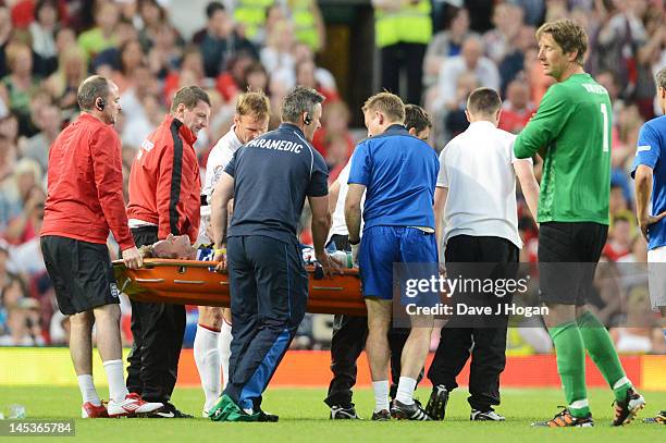 Teddy Sheringham injures Gordon Ramsay at Soccer Aid 2012 in aid of Unicef at Old Trafford on May 27, 2012 in Manchester, England.