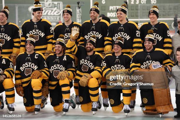 Nick Foligno of the Boston Bruins waves during the team photo prior to practice for the 2023 Winter Classic at Fenway Park on January 01, 2023 in...
