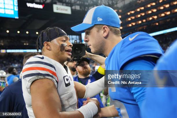 Justin Fields of the Chicago Bears and Jared Goff of the Detroit Lions embrace after the game at Ford Field on January 01, 2023 in Detroit, Michigan.