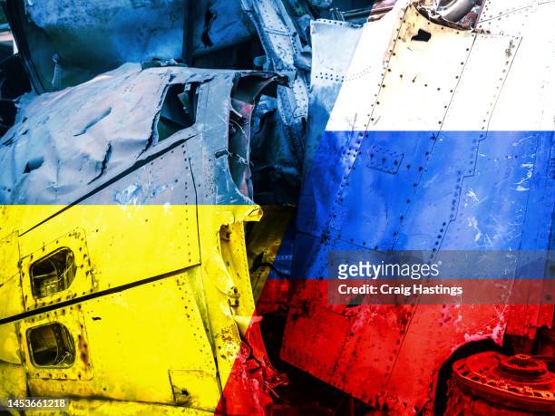 russia ukraine war concept with bomb and conflict damage of tanks and planes - ukraine russia conflict stockfoto's en -beelden