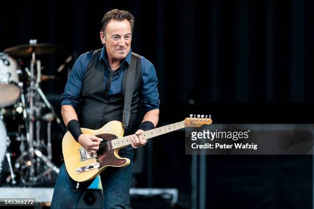 Bruce Springsteen performs on stage at the Rheinenergiestadion on May 27, 2012 in Cologne, Germany.