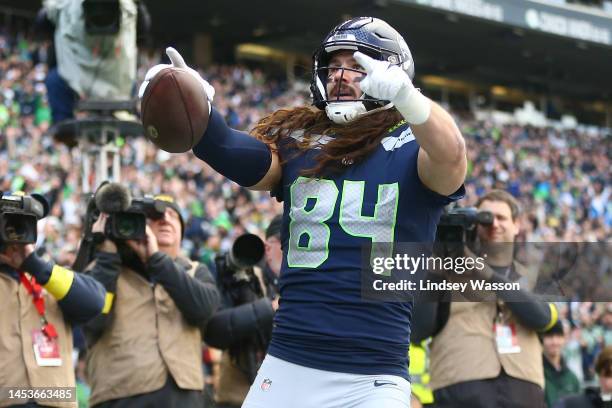 Colby Parkinson of the Seattle Seahawks celebrates after catching a pass for a touchdown against the New York Jets during the first quarter of the...