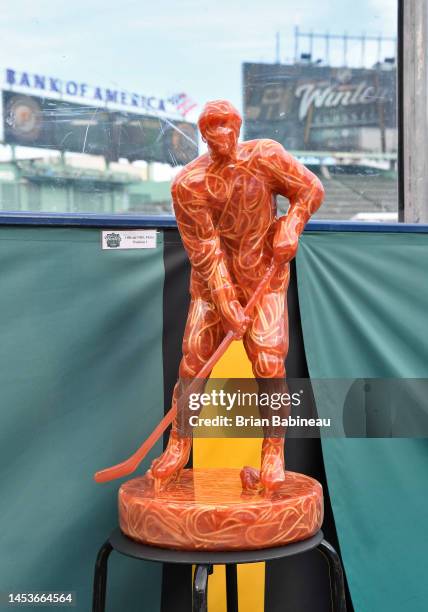 General view of a statue near the boards prior to the Boston Bruins practicing for the NHL Winter Classic at Fenway Park on January 01, 2023 in...