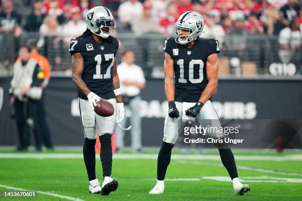 Davante Adams of the Las Vegas Raiders celebrates a touchdown with Mack Hollins of the Las Vegas Raiders against the San Francisco 49ers during the...
