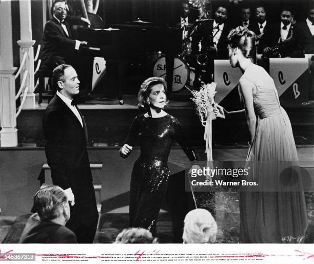 American actors Henry Fonda , Lauren Bacall and Fran Jeffries in a scene from 'Sex And The Single Girl', directed by Richard Quine, 1964.