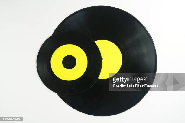 33rpm and 45rpm vinyl records - 45 rpm stock pictures, royalty-free photos & images