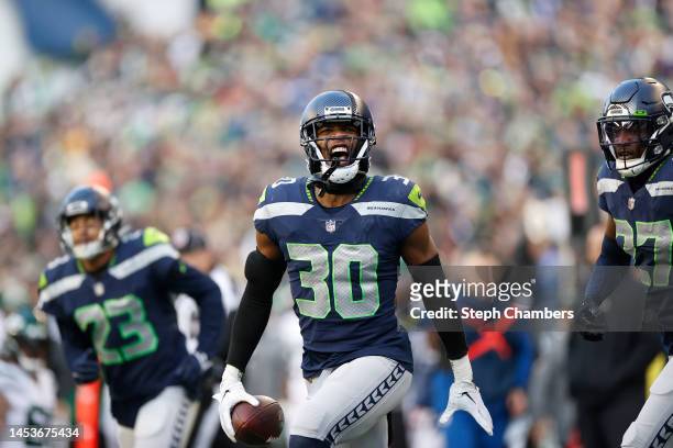 Mike Jackson of the Seattle Seahawks celebrates after an interception during the fourth quarter in the game against the New York Jets at Lumen Field...