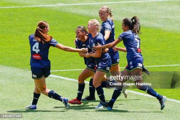 Michaela Robertson of the Phoenix celebrates with teammates after scoring a goal during the round eight A-League Women's match between Wellington...