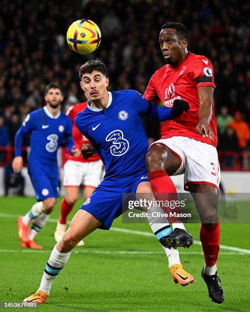 Kai Havertz of Chelsea is challenged by Willy Boly of Nottingham Forest during the Premier League match between Nottingham Forest and Chelsea FC at...
