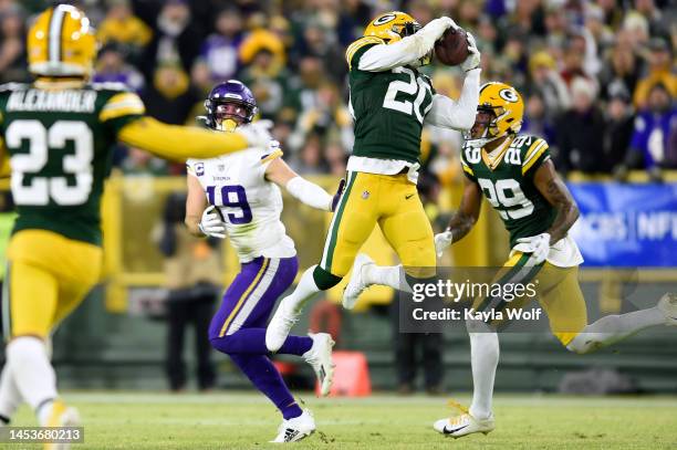 Rudy Ford of the Green Bay Packers makes an interception during the fourth quarter against the Minnesota Vikings at Lambeau Field on January 01, 2023...