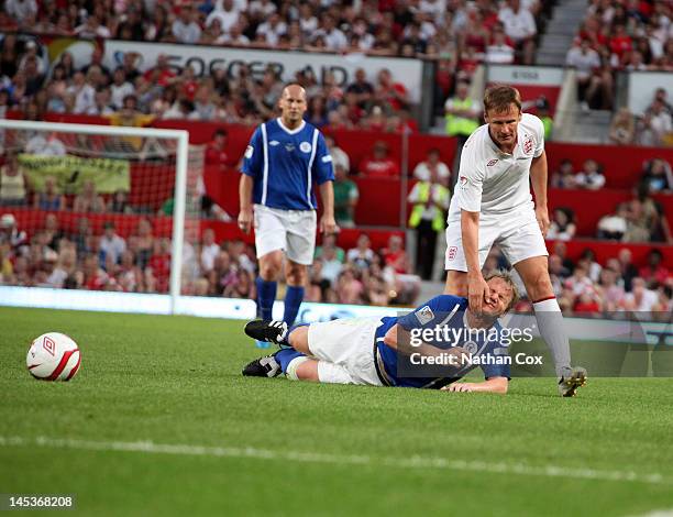 Gordon Ramsay and Teddy Sheringham participate in the Soccer Aid football match in aid of Unicef at Old Trafford at Old Trafford on May 27, 2012 in...