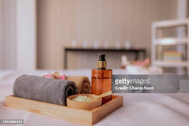 beautiful spa composition on massage table in wellness center. beauty spa treatment and relax concept. - エステ ストックフォトと画像