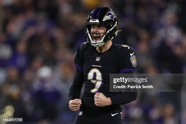 Justin Tucker of the Baltimore Ravens celebrates after kicking a 51-yard field goal against the Pittsburgh Steelers during the third quarter at M&T...