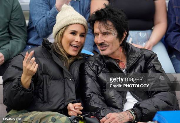 Brittany Furlan and Tommy Lee are seen at the Los Angeles Chargers vs the Los Angeles Rams Football Game at SoFi Stadium on January 01, 2023 in...