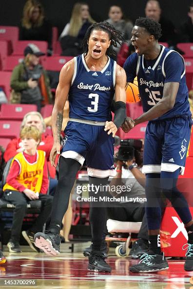 Corey Washington of the St. Peter's Peacocks celebrates a shot during ...