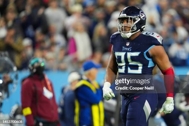 DeMarcus Walker of the Tennessee Titans celebrates after the play against the Dallas Cowboys at Nissan Stadium on December 29, 2022 in Nashville,...