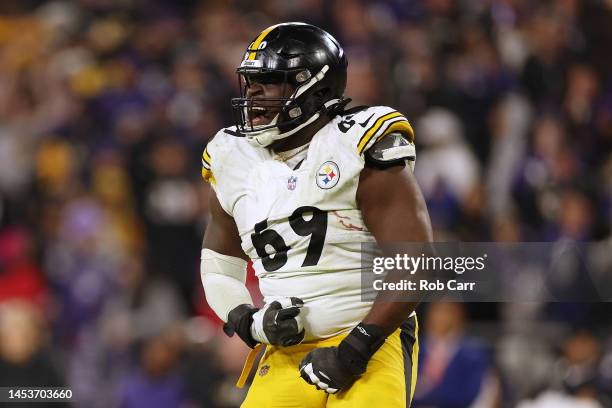 Kevin Dotson of the Pittsburgh Steelers celebrates a touchdown by Najee Harris during the fourth quarter at M&T Bank Stadium on January 01, 2023 in...
