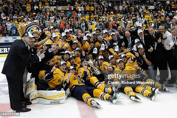 Members of the Shawinigan Cataractes pose for a team photo with the Memorial Cup after defeating the London Knights during the 2012 MasterCard...