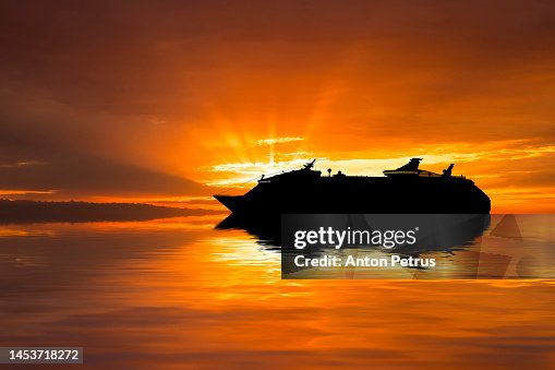 Cruise liner at sea with a beautiful sunset