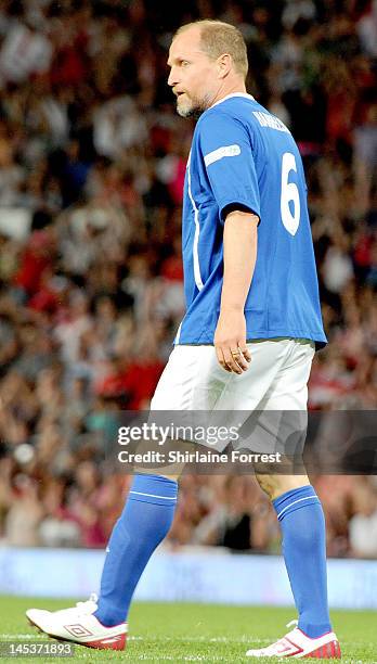 Woody Harrelson plays in the charity football event Soccer Aid 2012 to raise funds for UNICEF on May 27, 2012 in Manchester, United Kingdom.