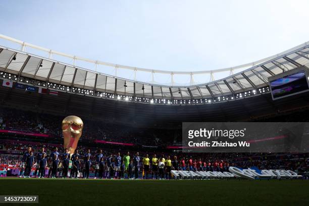 Players of both team line up for team photo during the FIFA World Cup Qatar 2022 Group E match between Japan and Costa Rica at Ahmad Bin Ali Stadium...