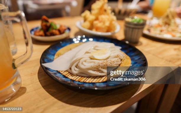 zaru udon noodle with clear soup  eat with tempura japanese style - カレーうどん ストックフォトと画像