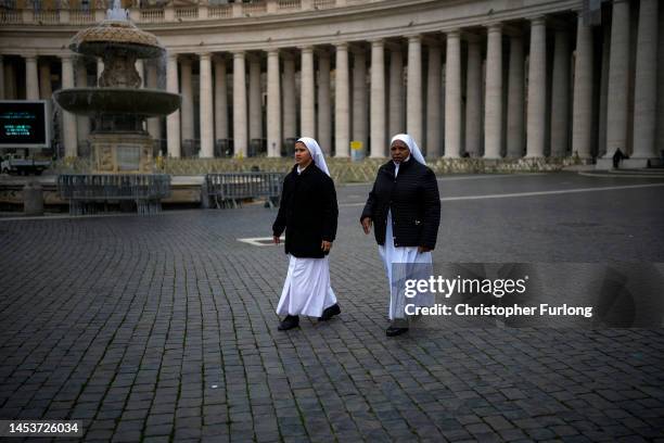 Nuns begin to arrive in St Peter's Square to pay their respects to the late Pope Emeritus Benedict XVI on January 02, 2023 in Vatican City, Vatican....