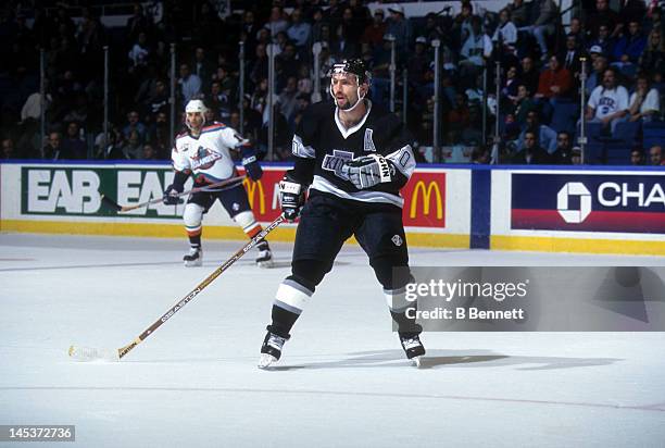 Ray Ferraro of the Los Angeles Kings skates on the ice during an NHL game against the New York Islanders on December 17, 1996 at the Nassau Coliseum...