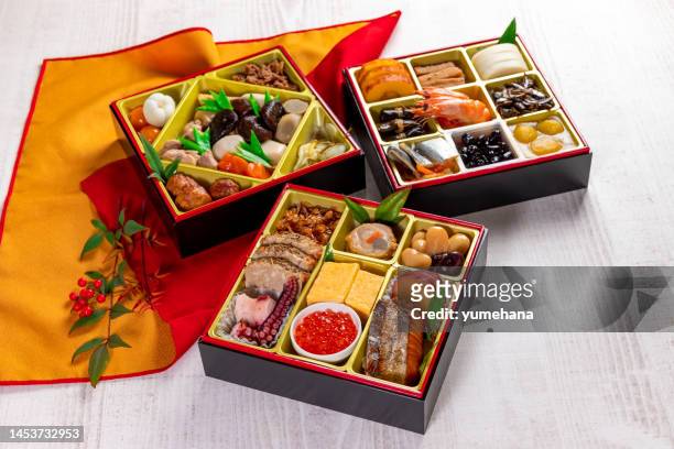 osechi - traditional japanese new year's dish - osechi ryori stock pictures, royalty-free photos & images