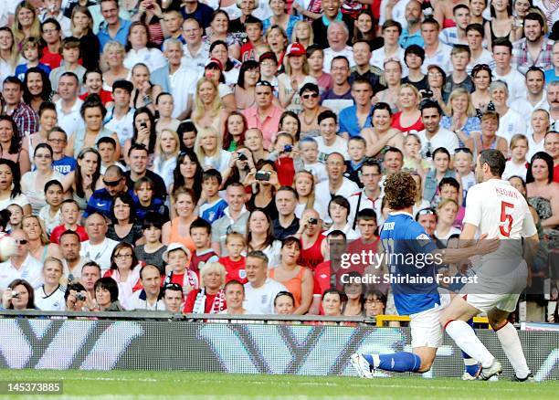 Gerard Butler and Martin Keown play in charity football event Soccer Aid 2012 to raise funds for UNICEF on May 27, 2012 in Manchester, United Kingdom.