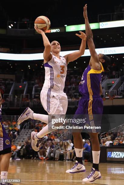 Diana Taurasi of the Phoenix Mercury puts up a shot against the Los Angeles Sparks during the WNBA game at US Airways Center on May 26, 2012 in...