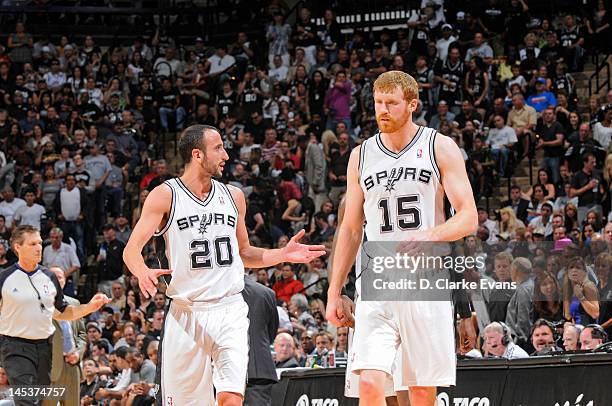 Manu Ginobili and Matt Bonner of the San Antonio Spurs talk during the game against the Oklahoma City Thunder in Game One of the Western Conference...