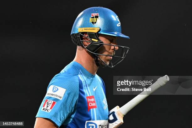 Chris Lynn of the Strikers leaves the field after being dismissed during the Men's Big Bash League match between the Hobart Hurricanes and the...