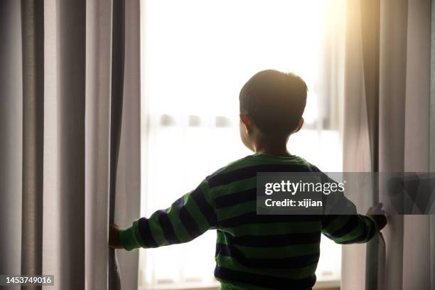 Kid Opening Window 38,675 Child Looking Out Window Stock Photos, High-Res Pictures, and ...