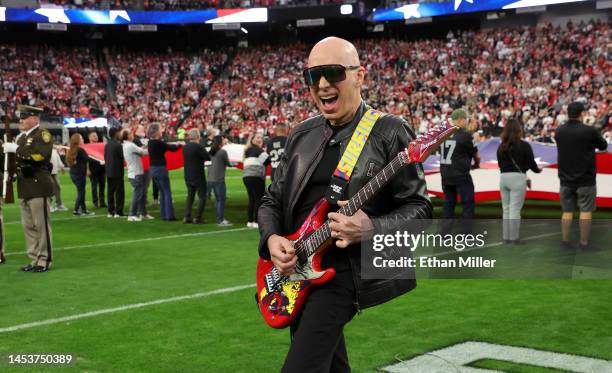 Guitarist Joe Satriani performs the American national anthem on his signature Ibanez JS20 guitar with the Silver Surfer graphic from his "Surfing...