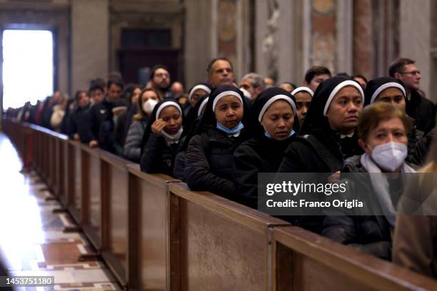 Nuns line up to see the body of Pope Emeritus Benedict XVI at St. Peter's Basilica on January 02, 2023 in Rome, Italy. Joseph Aloisius Rltzinger was...