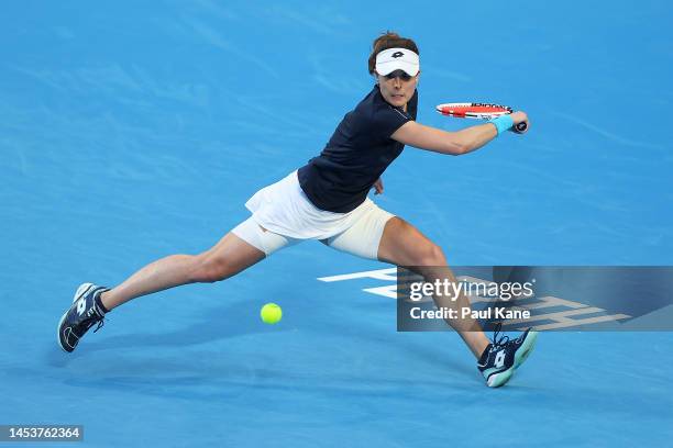 Alize Cornet of France plays a backhand in the Women's singles match against Donna Vekic of Croatia during day five of the 2023 United Cup at RAC...