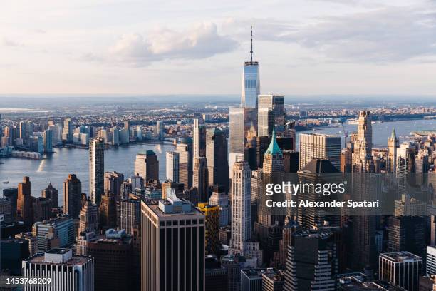aerial helicopter view of manhattan financial district, new york city, usa - aircraft skyscrapers ストックフォトと画像