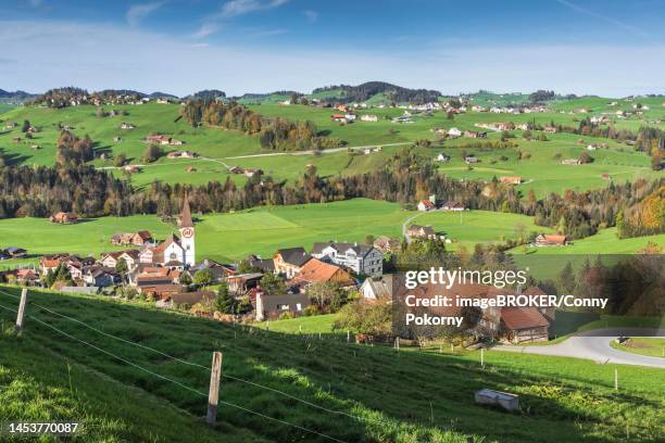 hilly landscape with villages, green meadows and pastures in appenzellerland, haslen, canton appenzell-innerrhoden, switzerland - appenzell innerrhoden stock pictures, royalty-free photos & images