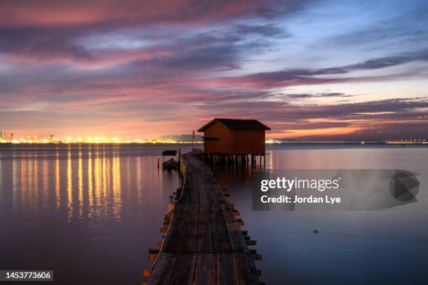 the tan jetty boardwalk at the clan jetties, penang, - penang state stock pictures, royalty-free photos & images