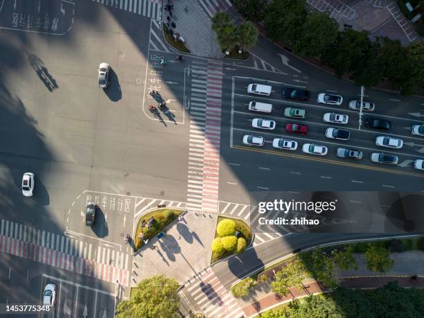 light effect overlooking city lanes - crossroad stock pictures, royalty-free photos & images