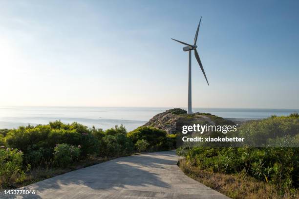 wind turbine on mountain - sustainable development goals 個照片及圖片檔