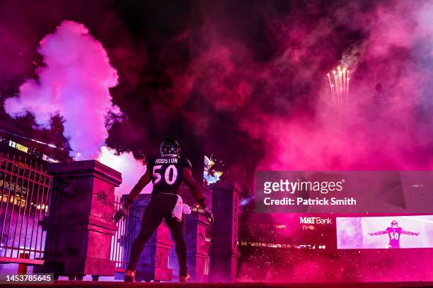 Linebacker Justin Houston of the Baltimore Ravens is introduced to the crowd before playing against the Pittsburgh Steelers at M&T Bank Stadium on...