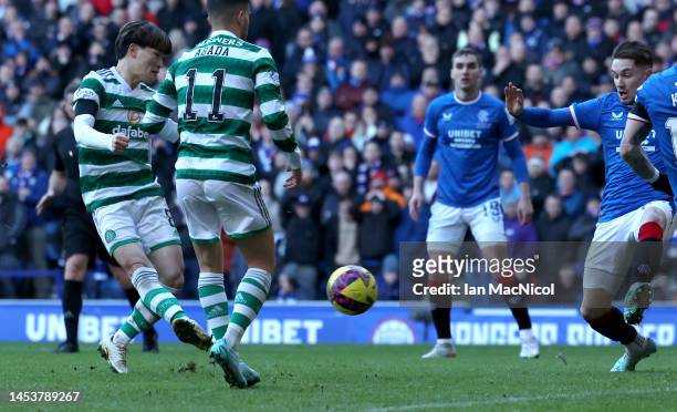 Kyogo Furuhashi of Celtic scores his teams second goal during the Cinch Scottish Premiership match between Rangers FC and Celtic FC at on January 02,...