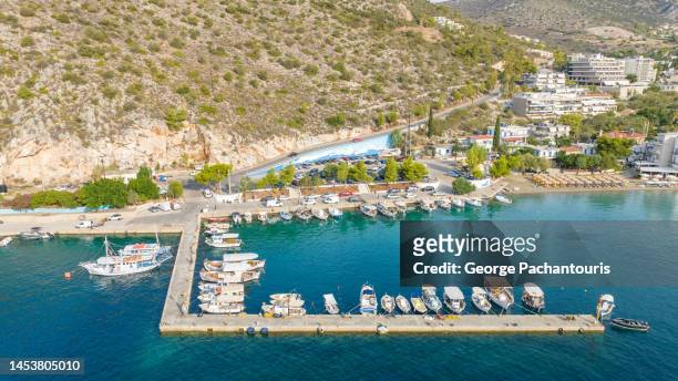 aerial photo of the harbor of the fishing village of tolo, greece - otlo stock pictures, royalty-free photos & images