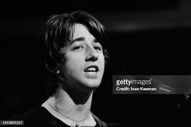 English musician Tony Hicks, lead guitarist with the Hollies, during a performance of the song 'Bus Stop' on the set of the Associated Rediffusion...