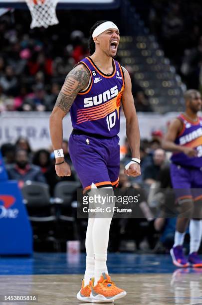 Damion Lee of the Phoenix Suns celebrates during the game against the Washington Wizards at Capital One Arena on December 28, 2022 in Washington, DC....