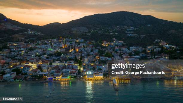 aerial photo of seaside village of tolo, greece at dusk - otlo stock pictures, royalty-free photos & images