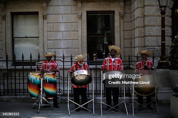 Steel band plays prior to leading the artists' procession from the Royal Academy of the Art's courtyard to a service held at St James' Church on...